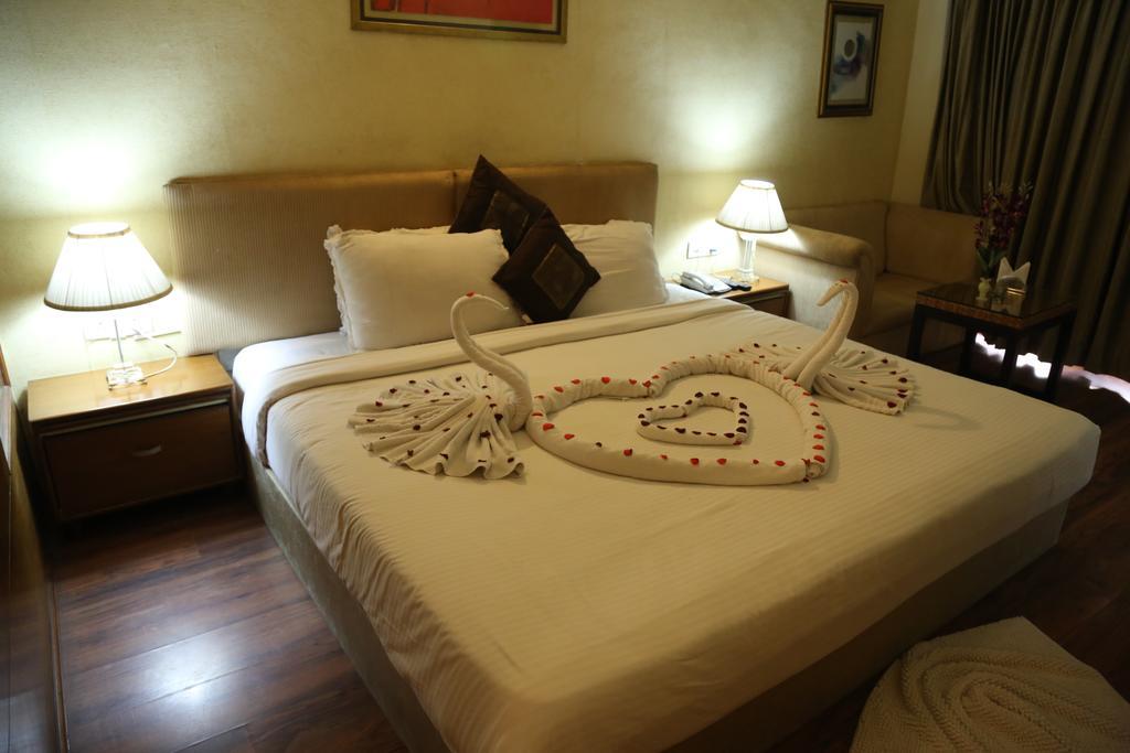 Meuse Jupiter Business And Luxury Hotel Nashik Quarto foto